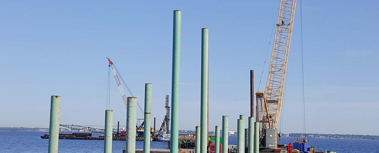 crane laying poles for Pensacola Bay Bridge